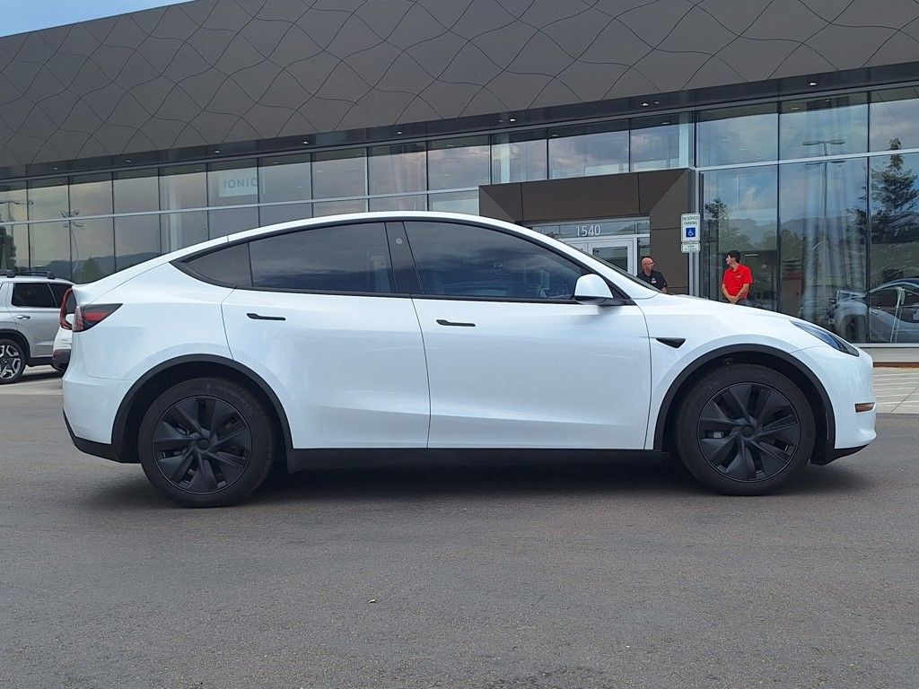 Used 2024 Tesla Model Y Long Range with VIN 7SAYGDEE7RF212700 for sale in Colorado Springs, CO