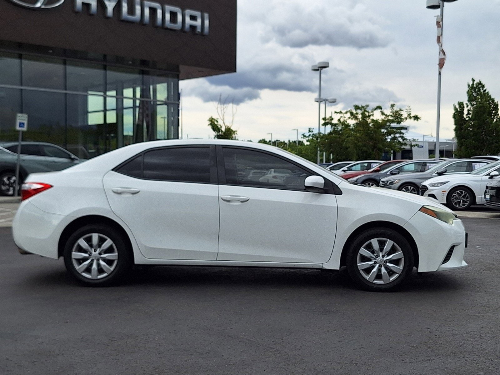 Used 2014 Toyota Corolla LE with VIN 5YFBURHE1EP166638 for sale in Colorado Springs, CO