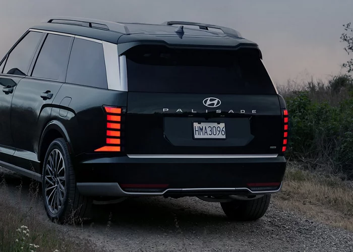 Rear three-quarter view of the redesigned 2027 Hyundai Palisade showcasing vertical LED taillights and rugged exterior styling in Colorado Springs