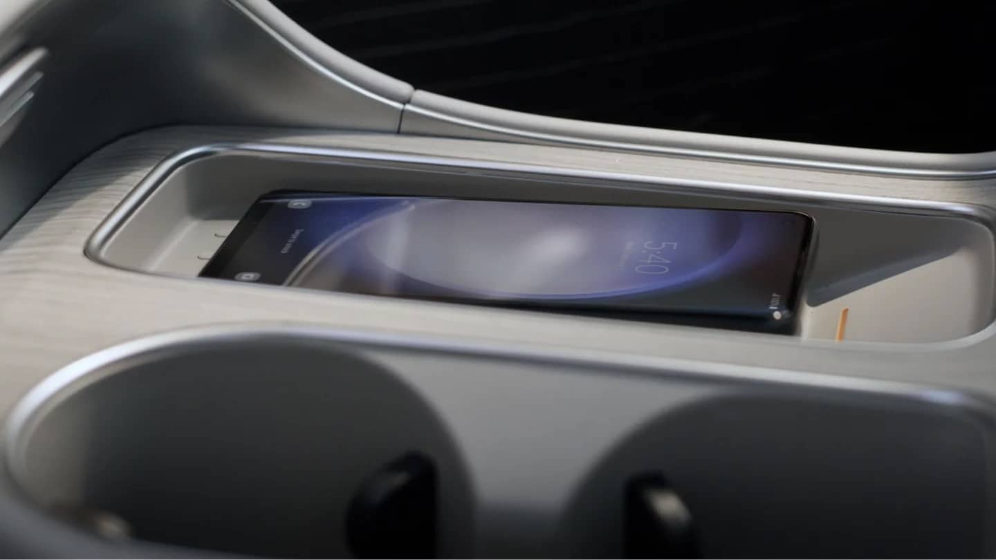 Smartphone resting in the center console of the 2027 Hyundai Palisade Hybrid