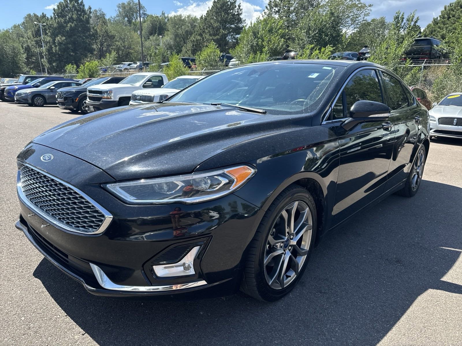 Used 2020 Ford Fusion Hybrid Titanium with VIN 3FA6P0RU7LR157286 for sale in Colorado Springs, CO