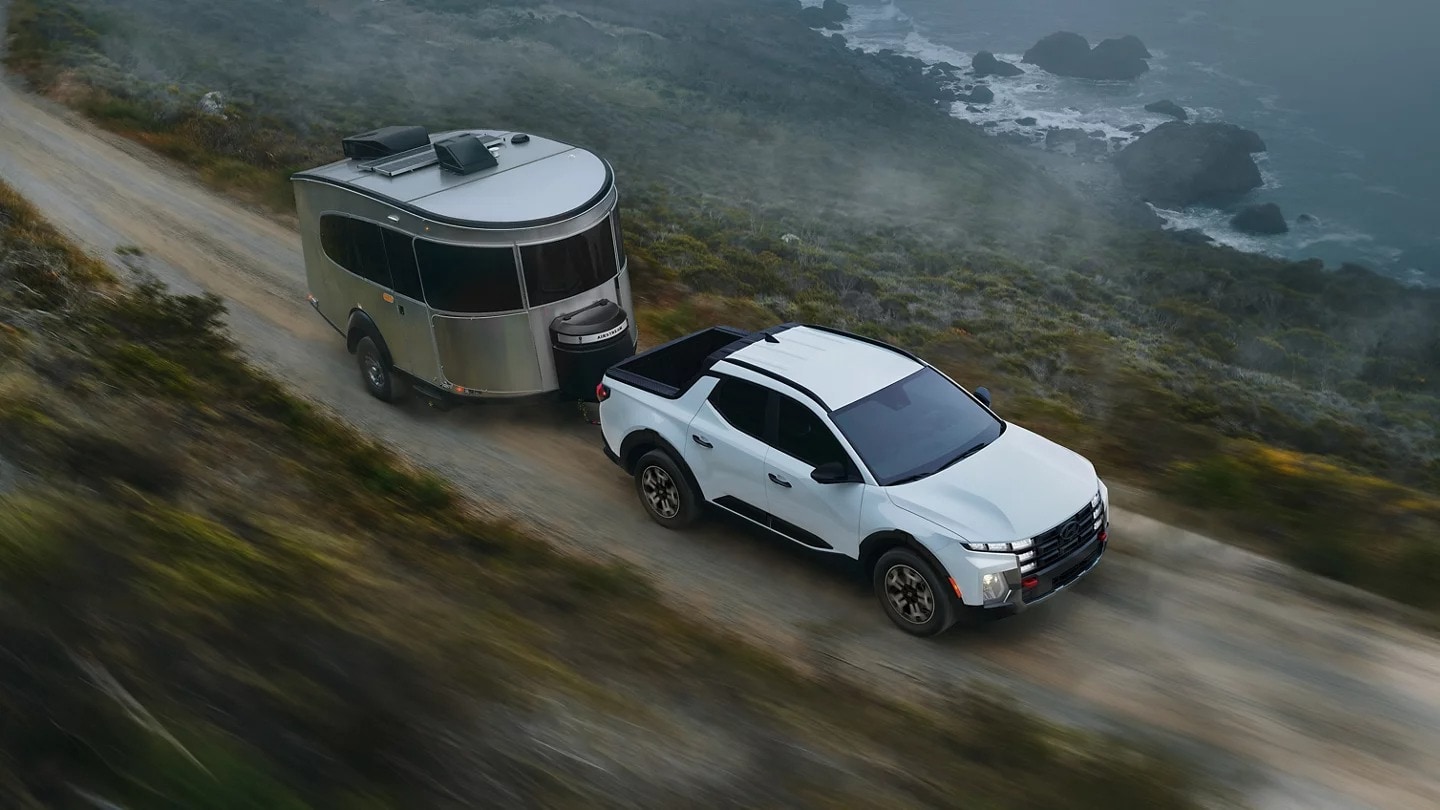 2026 SANTA CRUZ towing a trailer