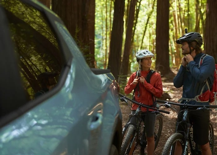 Mountain bikers beside the SANTA CRUZ