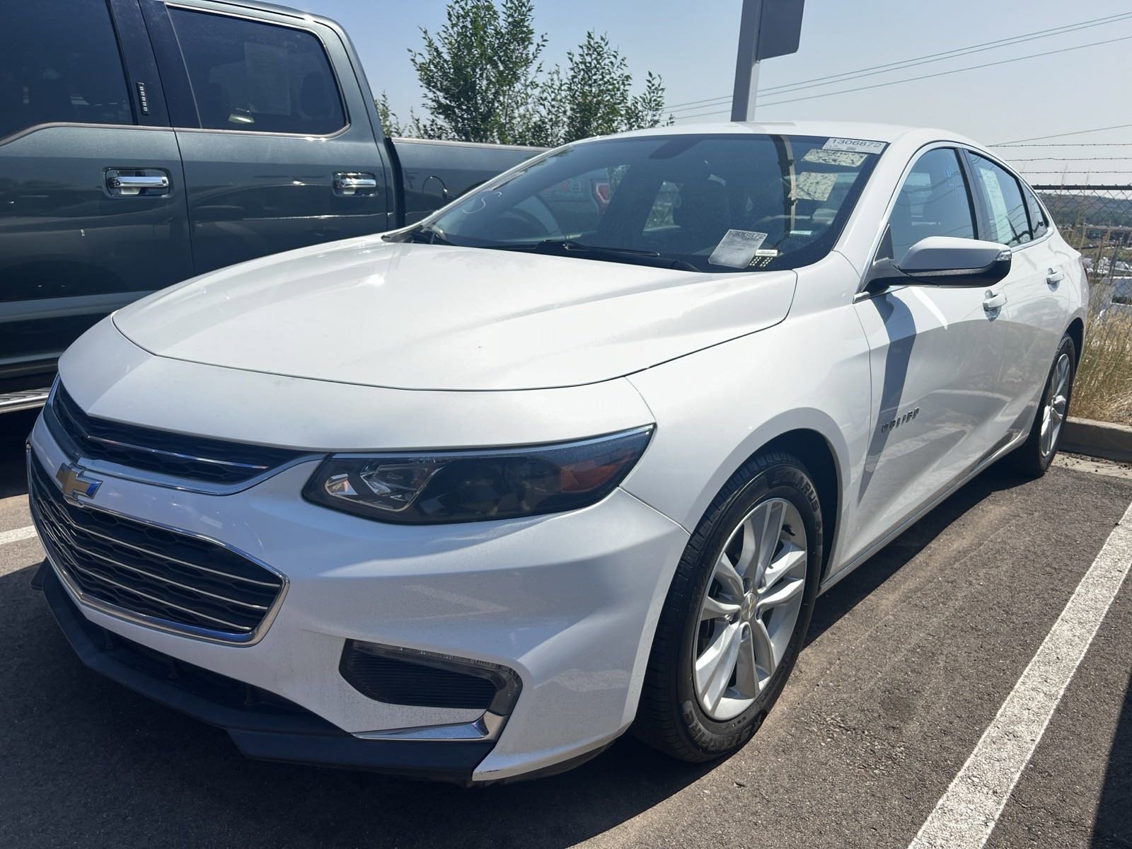 Used 2018 Chevrolet Malibu 1LT with VIN 1G1ZD5ST4JF214674 for sale in Colorado Springs, CO