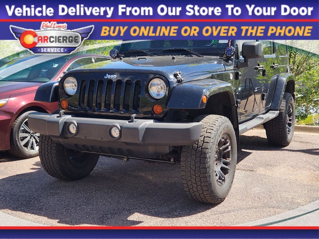 Used 2013 Jeep Wrangler Unlimited Sahara SUV