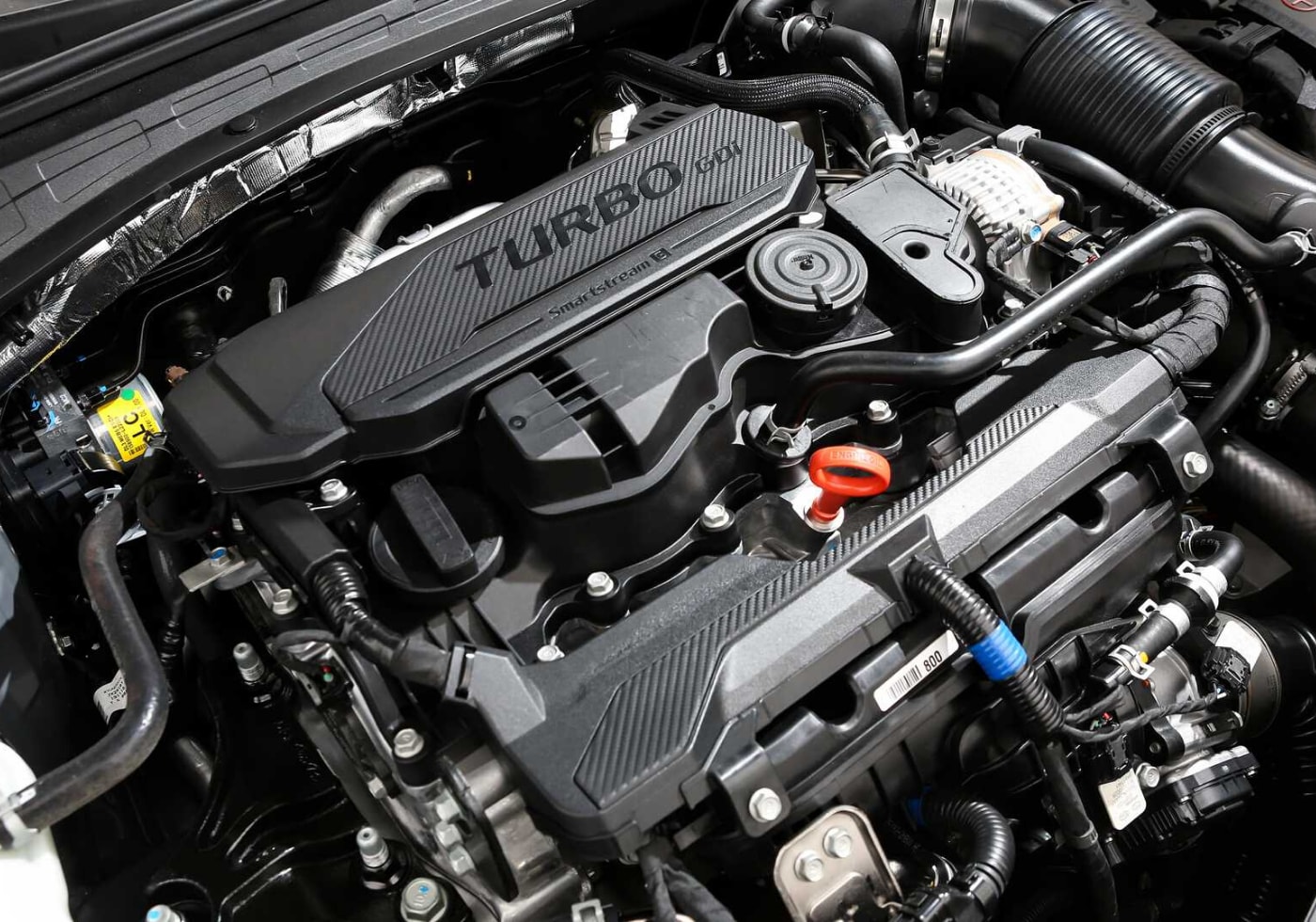 A look under the hood of the upcoming 2021 Kia K5 (Optima) showing a powerful, fuel-efficient turbo GDI engine