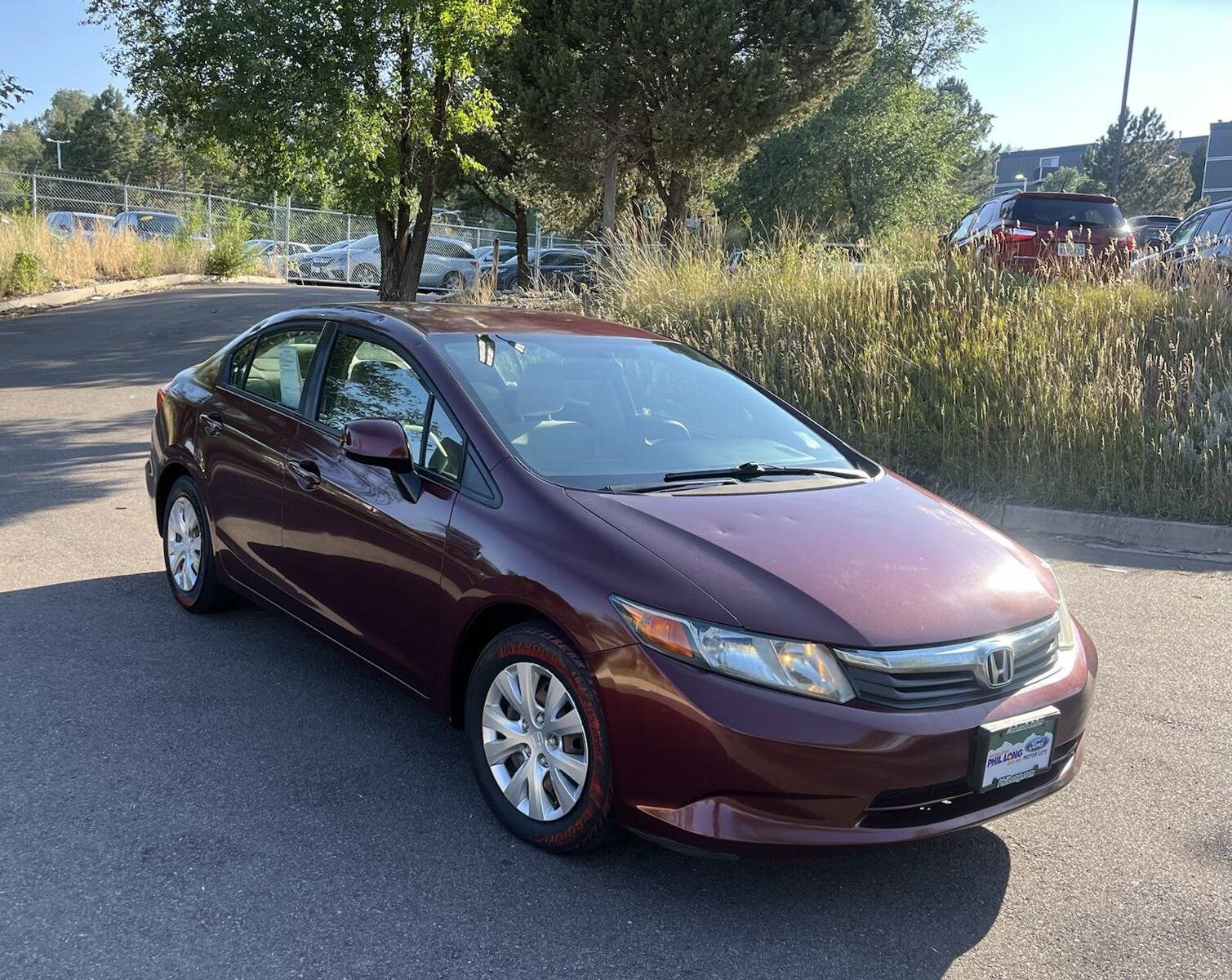 Used 2012 Honda Civic LX with VIN 2HGFB2F55CH591060 for sale in Colorado Springs, CO