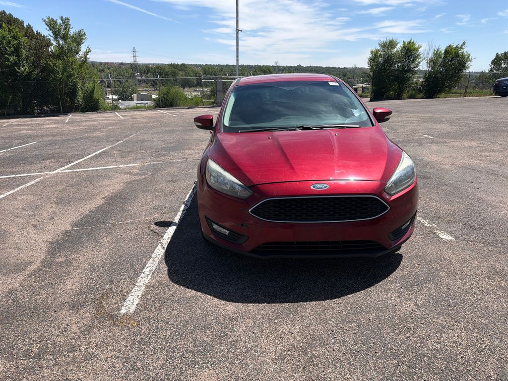 Used 2015 Ford Focus SE with VIN 1FADP3K29FL292306 for sale in Colorado Springs, CO