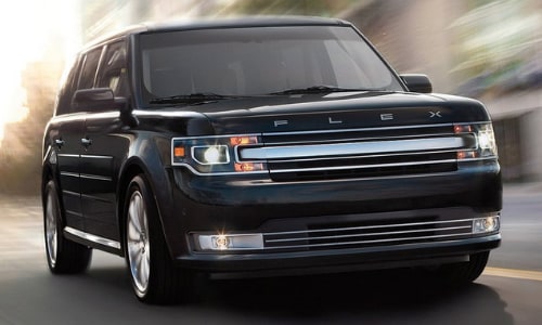 2020 Ford Flex black fast motion shot city street blurry backdrop