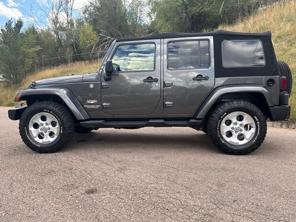 Used 2014 Jeep Wrangler Unlimited Sahara SUV