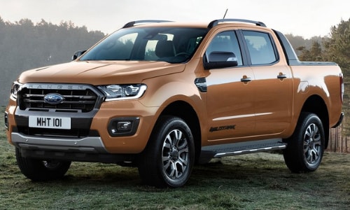 2020 Ford Ranger Wildtrak orange grassy knoll forest sunset
