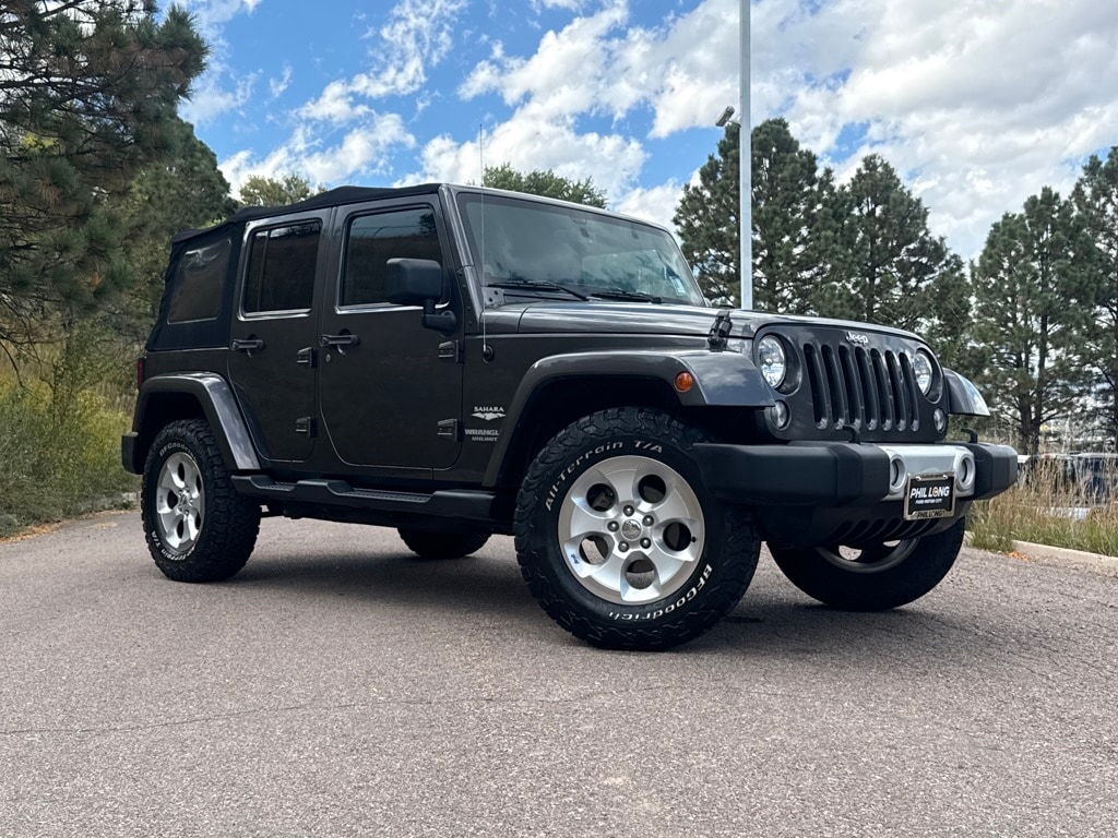 Used 2014 Jeep Wrangler Unlimited Sahara SUV