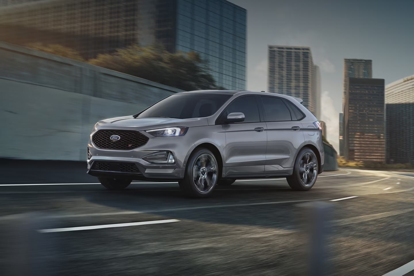 A Ford Edge driving though city streets.