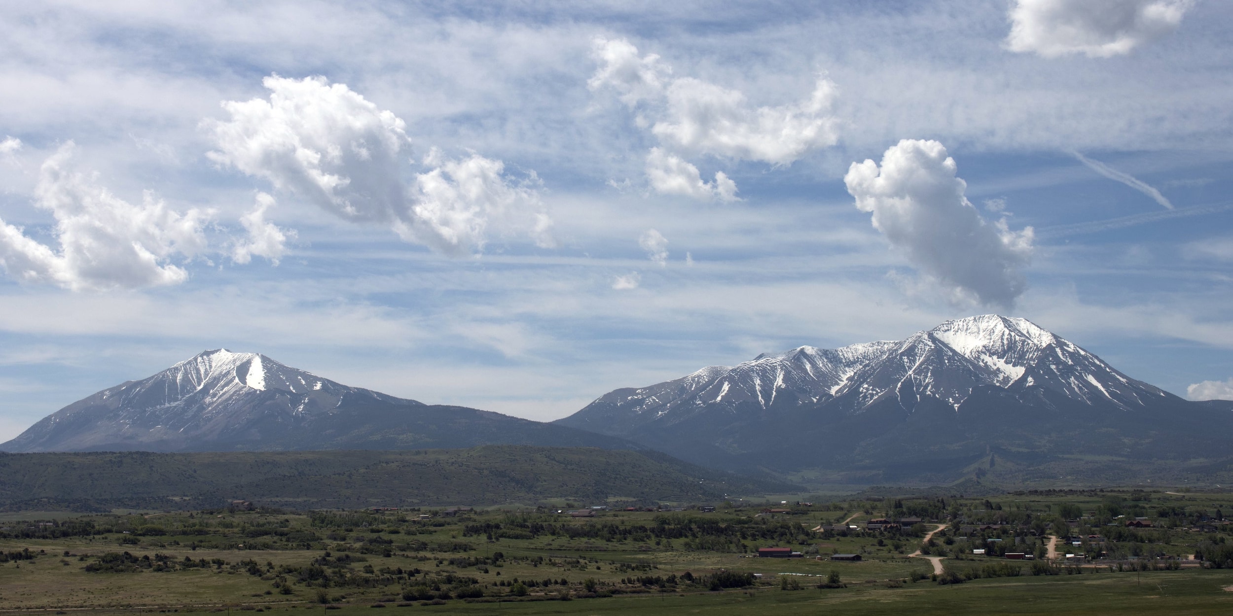 A view of the Spanish Peaks from the Highway of Legends