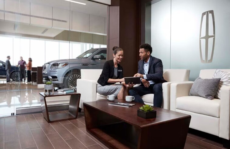 Black label experience in prestine dealership lobby