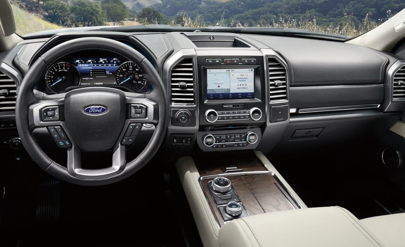 Front dashboard, touchscreen, steering wheel, and center console inside the 2021 Ford Expedition