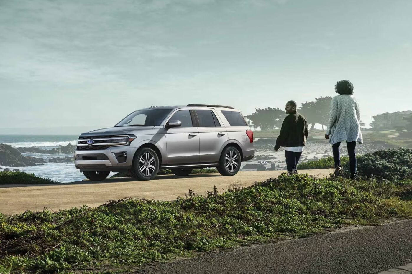 A profile view of a parked silver 2023 Ford Expedition Max