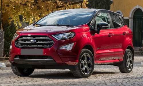 2020 Ford EcoSport red black roof parked driveway autumn leaves