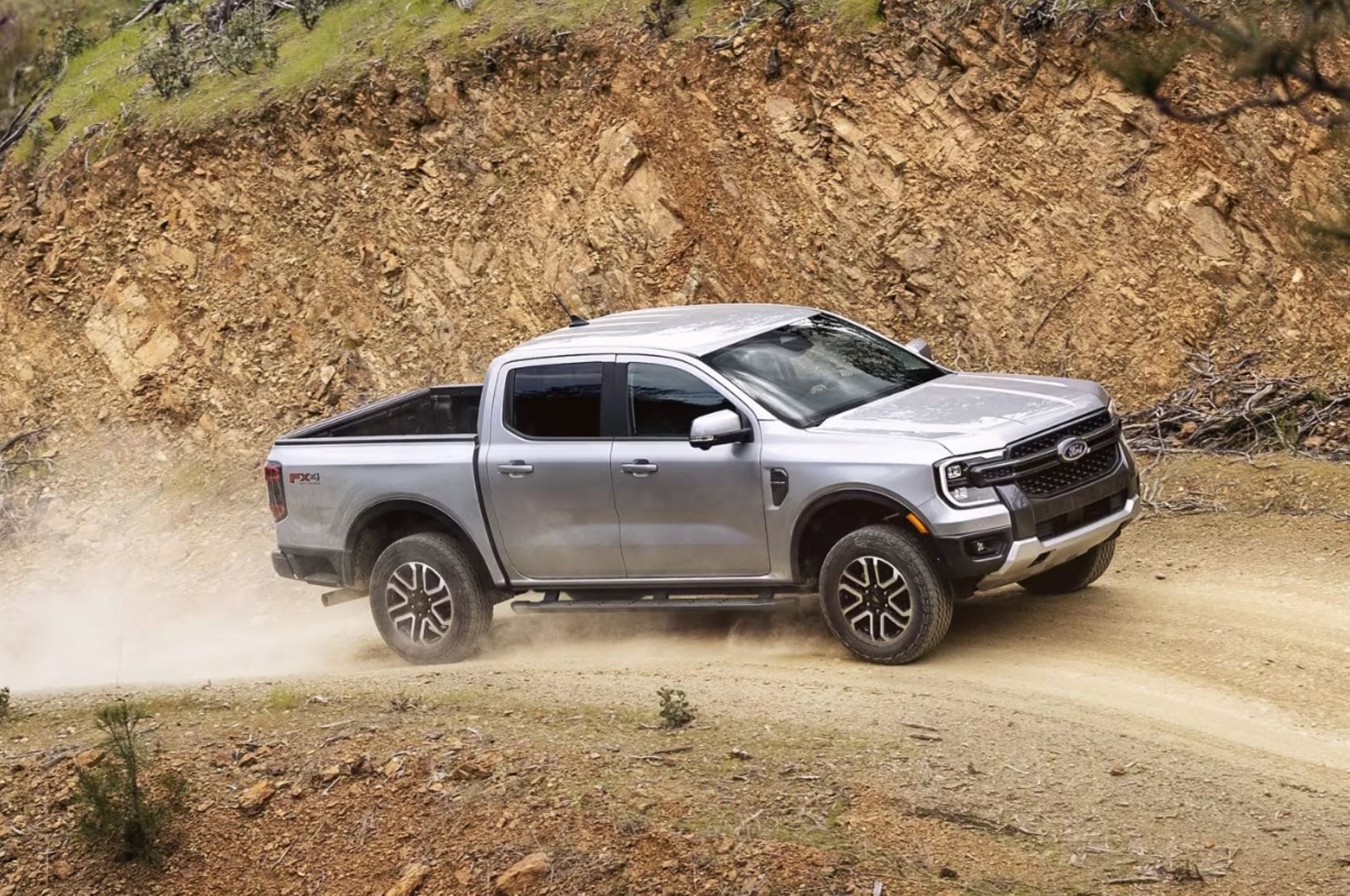 A Ford Ranger driving up a dirt road in New Mexico.