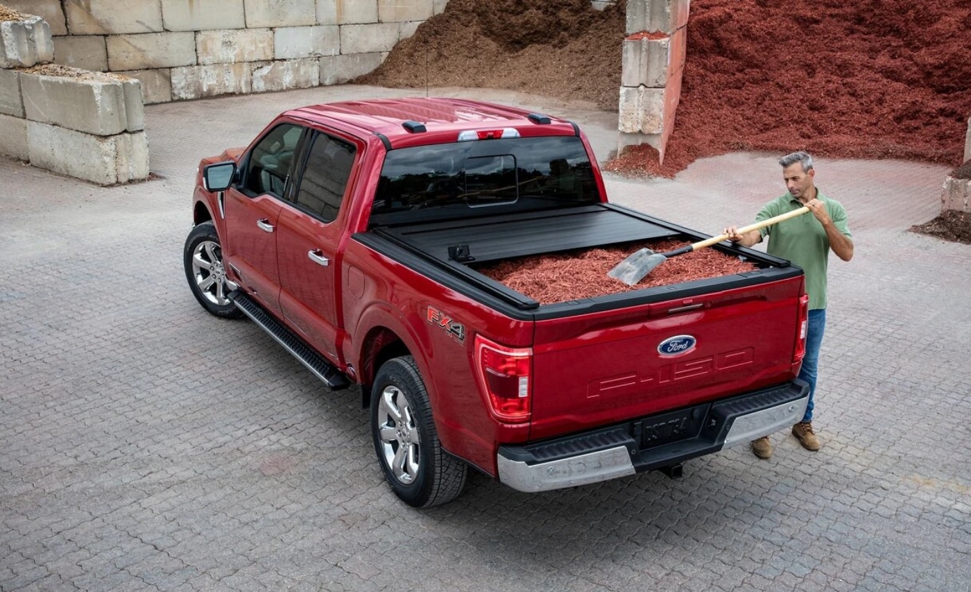 Rear exterior view of a red 2021 Ford F-150 SuperCrew truck