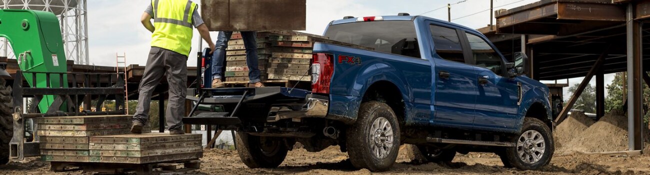 2020 Ford Super Duty hauling loads of cut lumber showing payload performance construction site