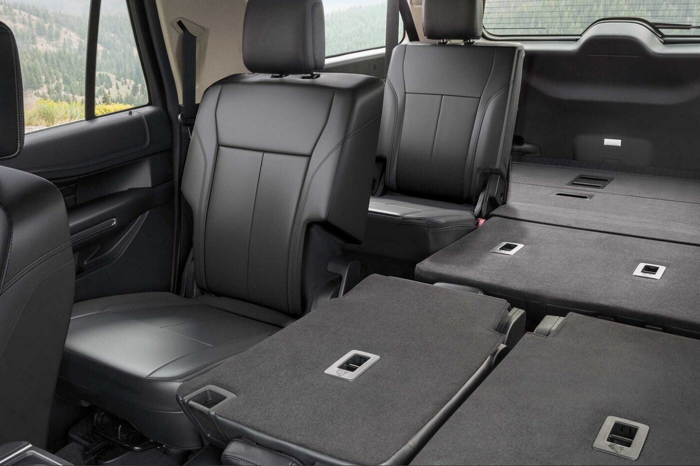 A view of the folded down seats in the back of a 2023 Ford Explorer Max