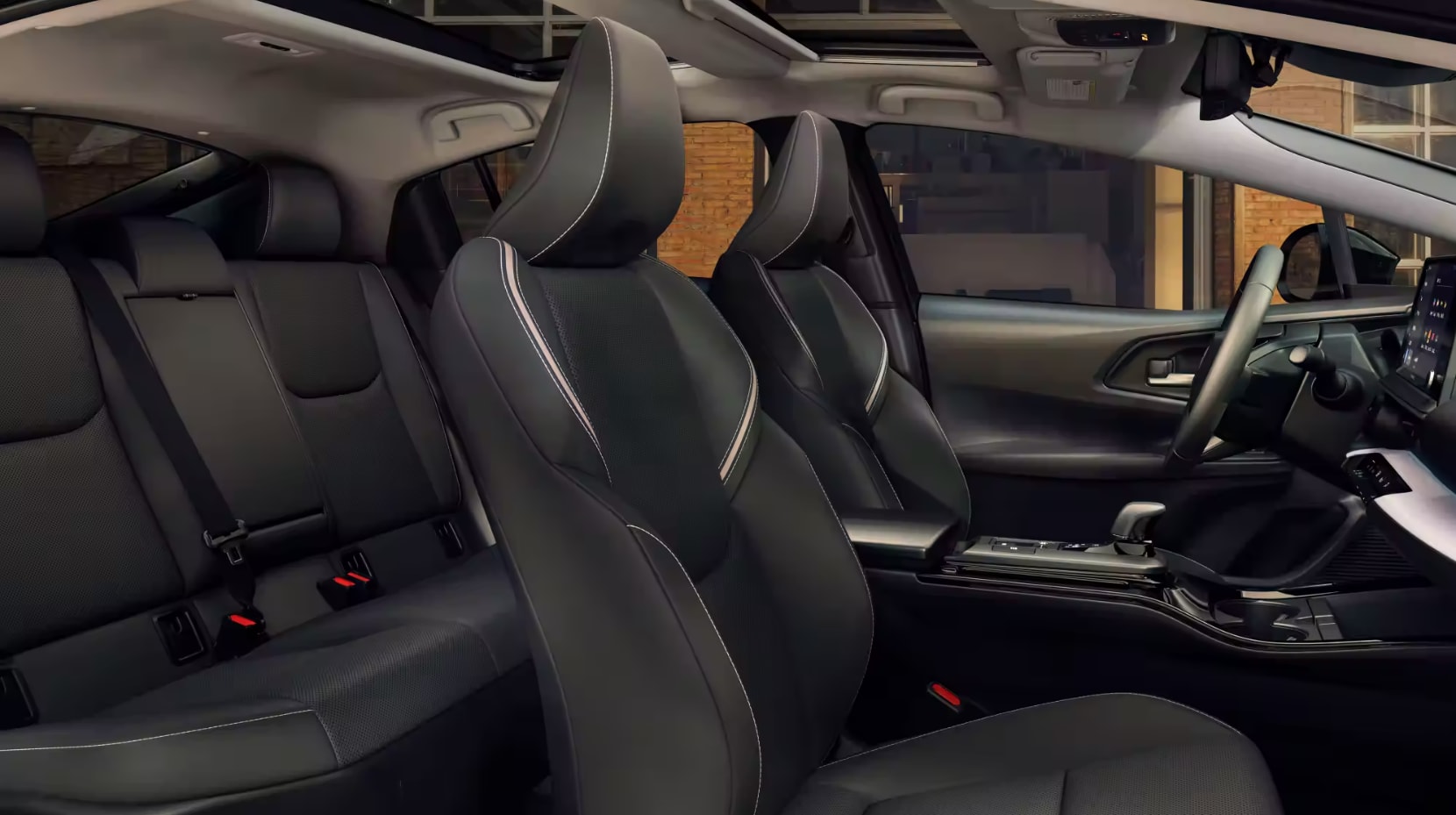 a view of the cabin and seating of a 2023 Toyota Prius