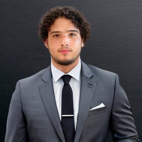 Staff member Jon Luc Rivero from ID_96d9749ee694