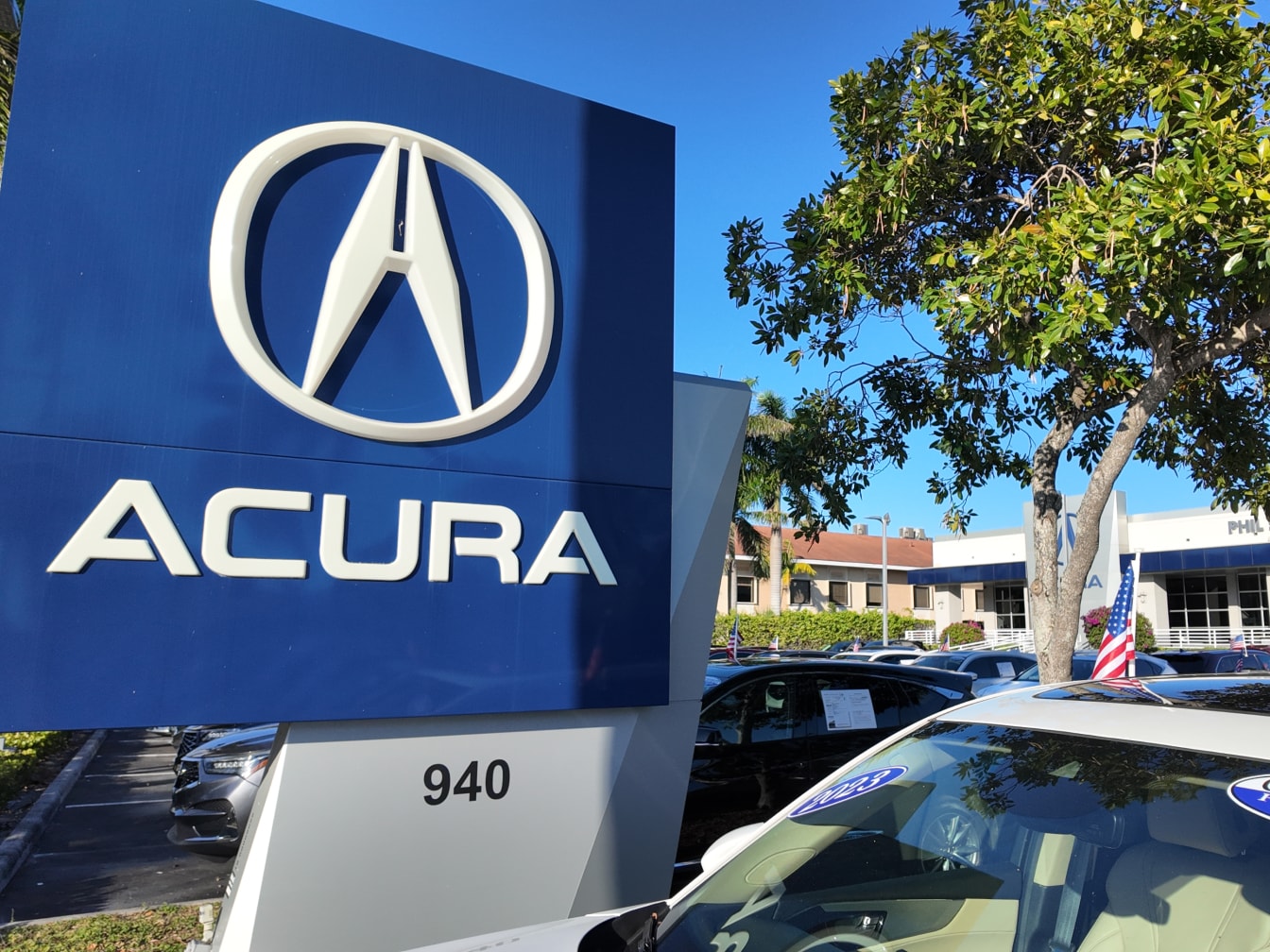 Phil Smith Acura dealership with cars in lot