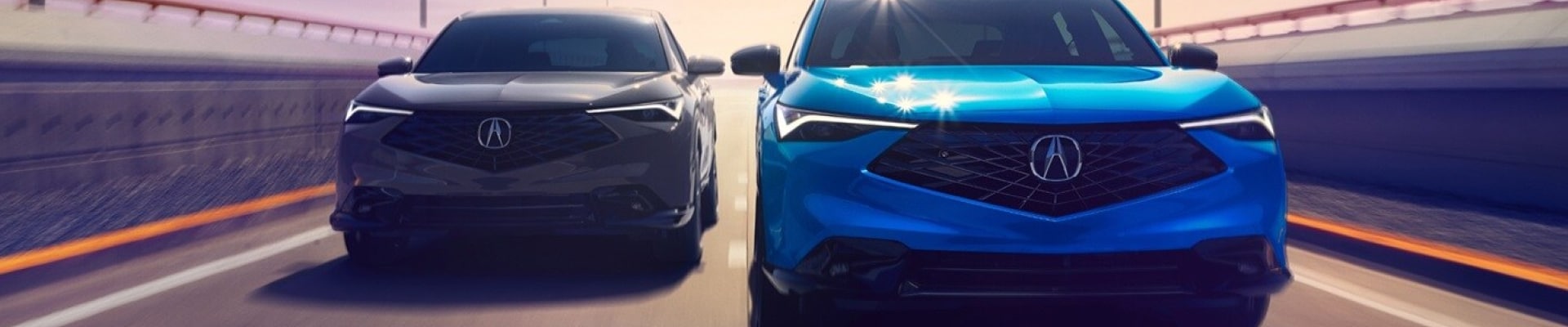 Two 2026 Acura ADX Vehicles Side by Side on the Highway