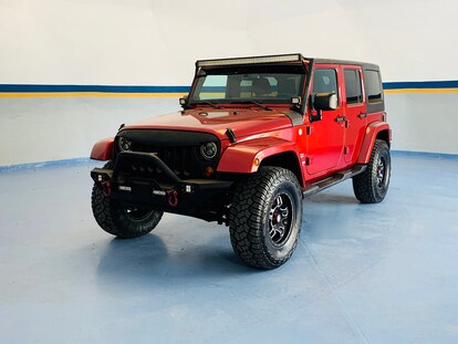 Used 2013 Jeep Wrangler Unlimited For Sale at Grand Tour Garage | VIN:  1C4BJWEG9DL595983