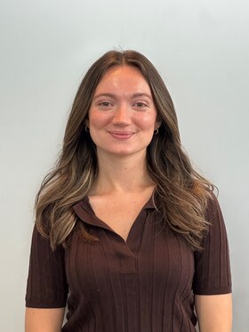 Staff member Emily Clark from ID_eb067b8f800a