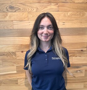 Staff member Emily Clark from ID_eb067b8f800a