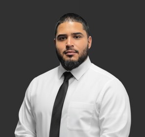 Staff member Wilfredo Pena from ID_f6a5e65191e0