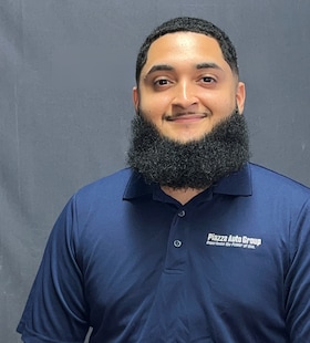 Staff member Alex Milanes from ID_e7873a4f239e