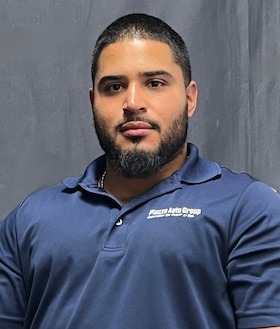 Staff member Wilfredo Pena from ID_f6a5e65191e0