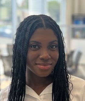 Staff member Maya Holmes from ID_6ba3d2d492c4