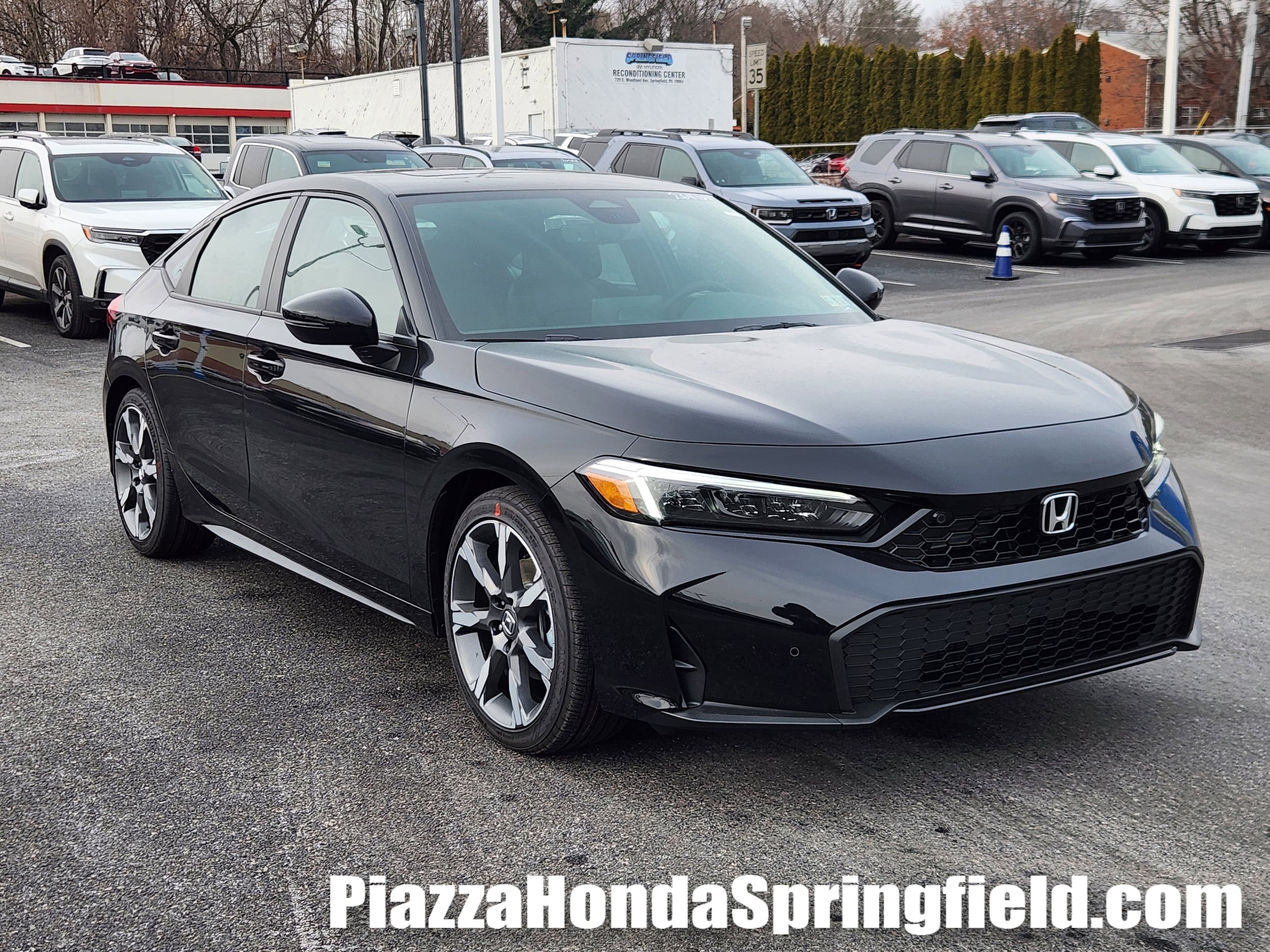 2026 Honda Civic Hatchback Sport Touring's photo