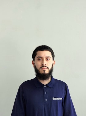 Staff member John Laporte from 330de6989294