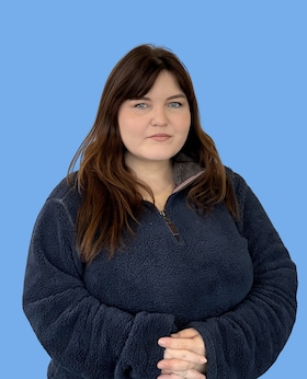 Staff member Nina Davis from ID_7dca84765ccf