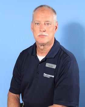 Staff member John Houser from ID_d1d1db58af77