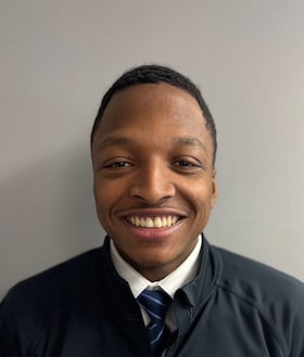 Staff member Amiyr James from ID_479f6d