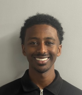 Staff member Peter Abraham from ID_479f6d