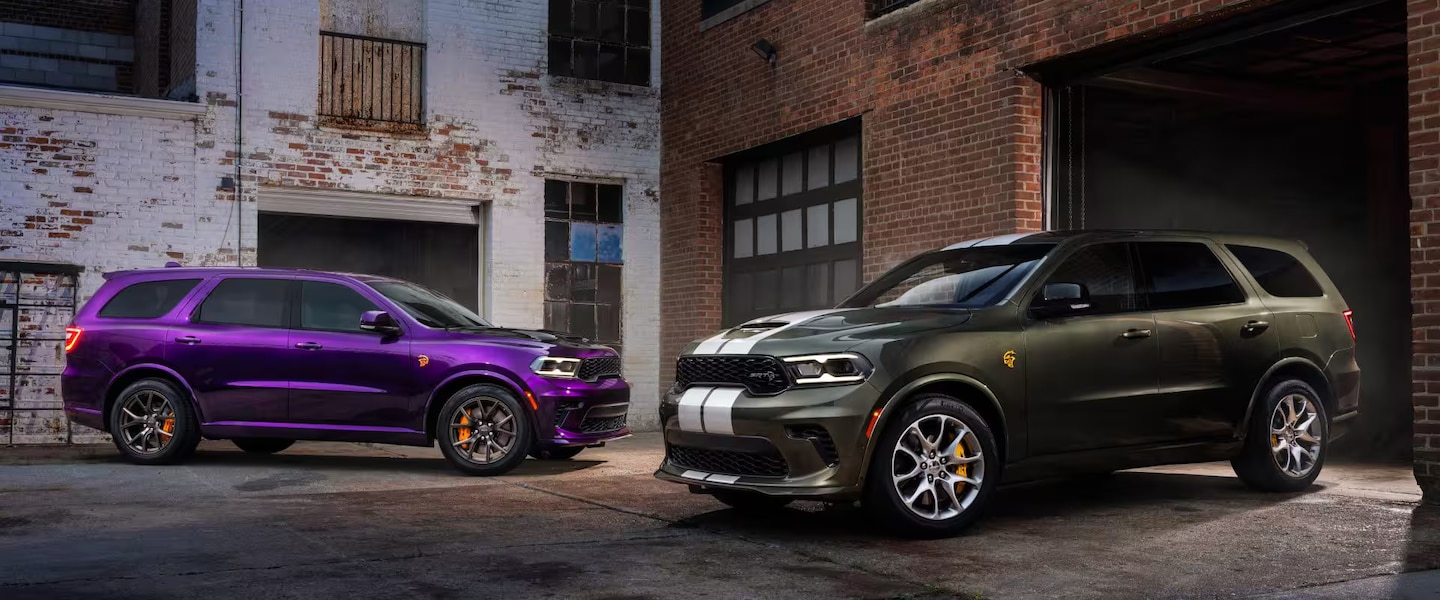 two 2026 dodge durangos side by side in an alley