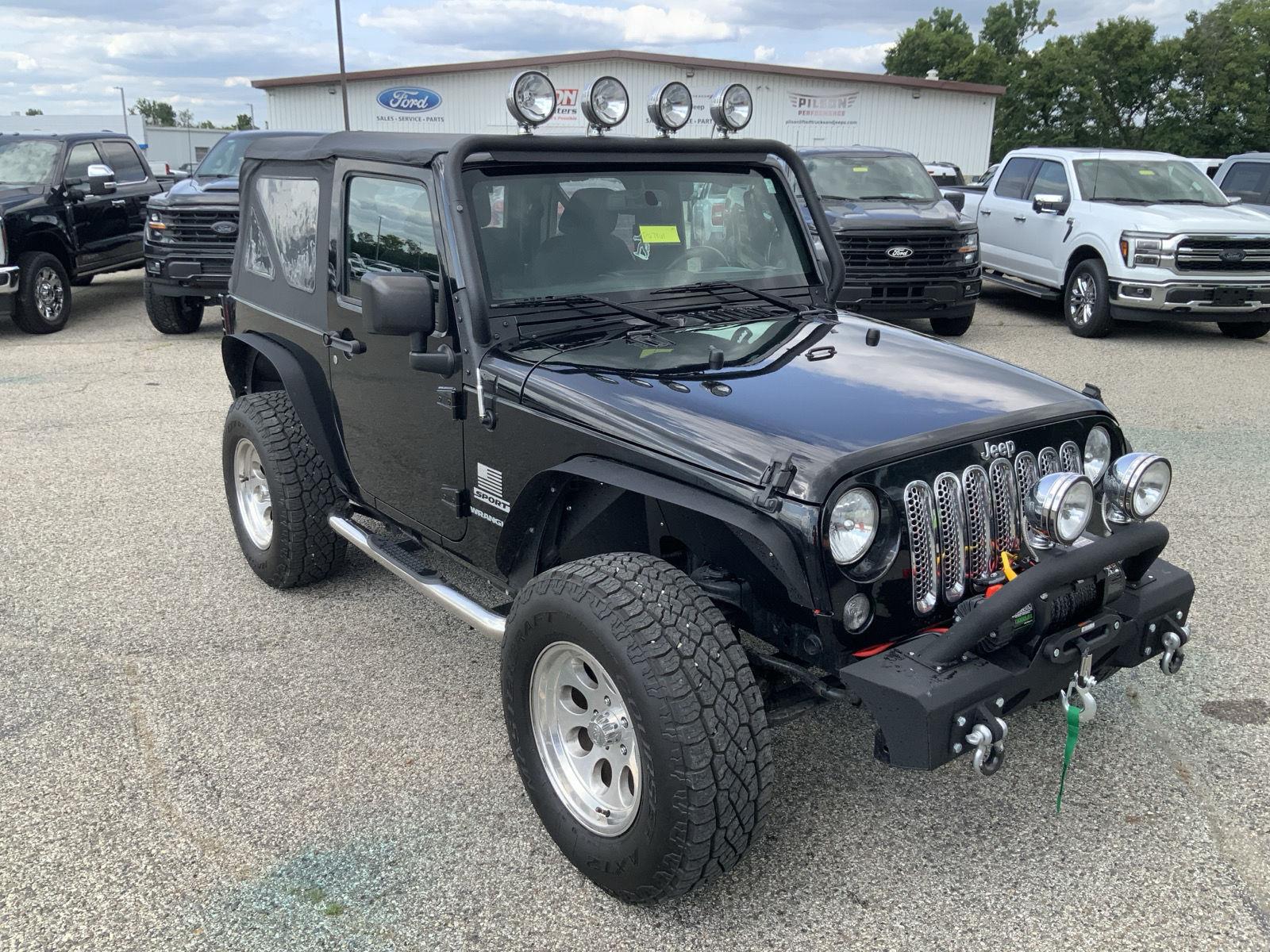 Used 2015 Jeep Wrangler Sport with VIN 1C4AJWAG0FL652690 for sale in Clinton, IN