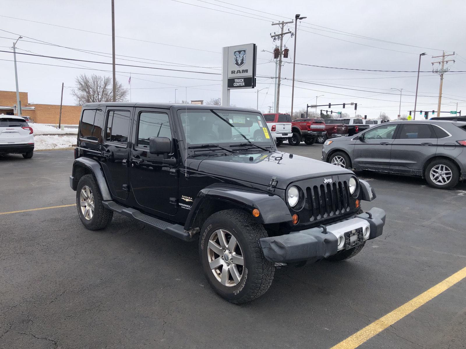 Used 2012 Jeep Wrangler Unlimited Sahara with VIN 1C4BJWEG6CL199217 for sale in Charleston, IL