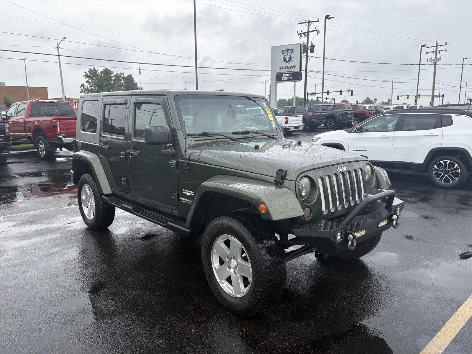 Used 2009 Jeep Wrangler Unlimited Sahara with VIN 1J4GA59139L741673 for sale in Charleston, IL