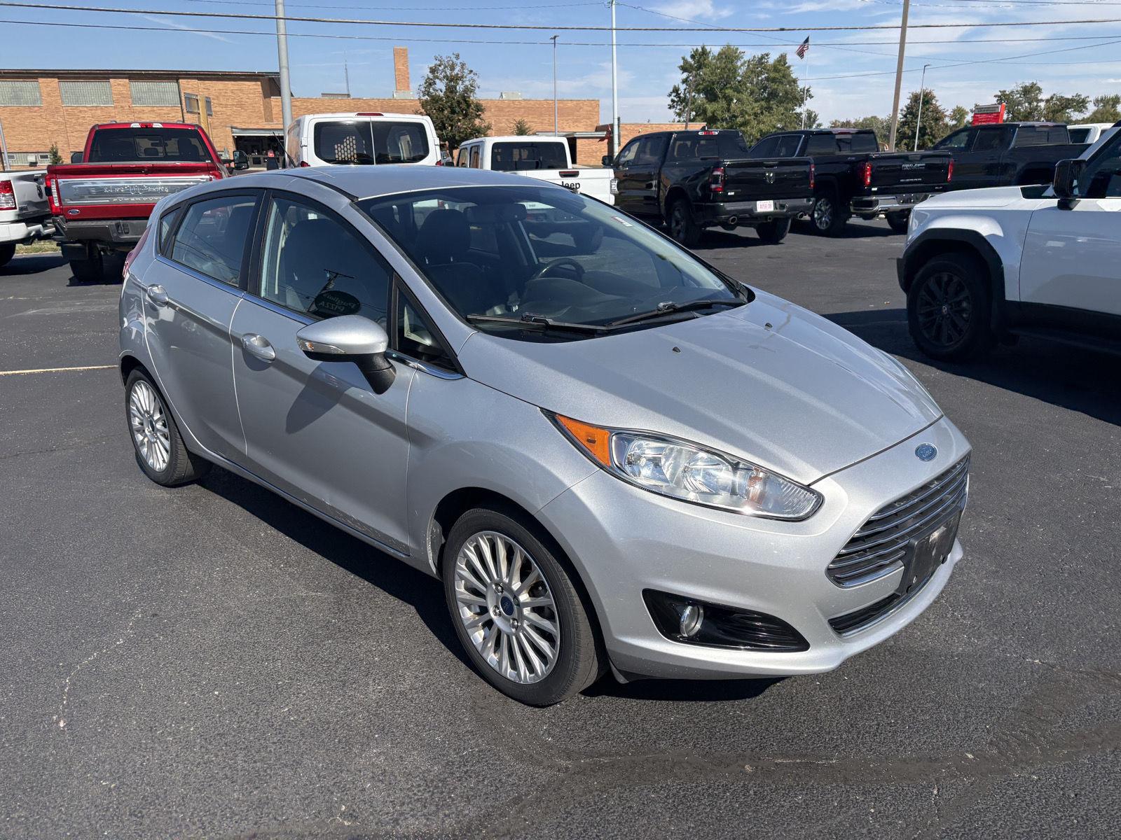 Used 2014 Ford Fiesta Titanium with VIN 3FADP4FJ1EM233772 for sale in Charleston, IL