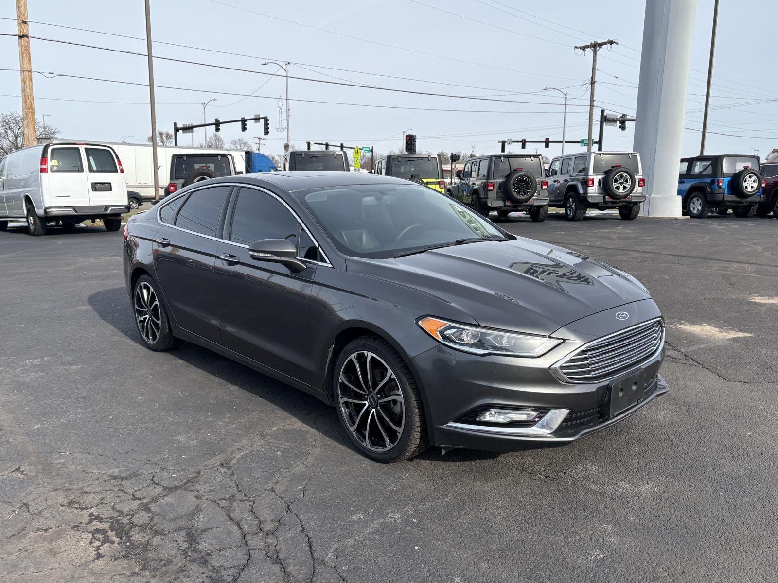 Used 2017 Ford Fusion Titanium with VIN 3FA6P0K99HR155150 for sale in Charleston, IL