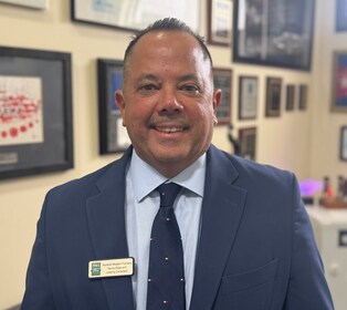 Staff member Rodolfo Fornaris from ID_390255